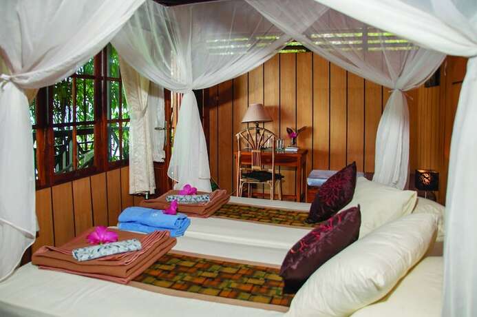 Imagen de la habitación del Hotel Froggies Divers Bunaken. Foto 15