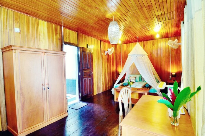 Imagen de la habitación del Hotel Froggies Divers Bunaken. Foto 17