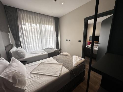 Imagen de la habitación del Hotel Frojd Kune Resort & Beach. Foto 16