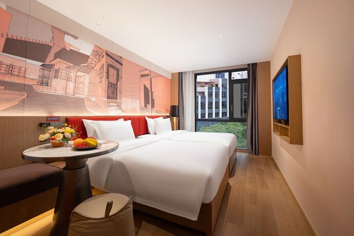 Imagen de la habitación del Hotel From.k Guangzhou. Foto 11