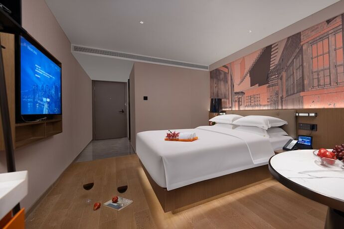 Imagen de la habitación del Hotel From.k Guangzhou. Foto 16