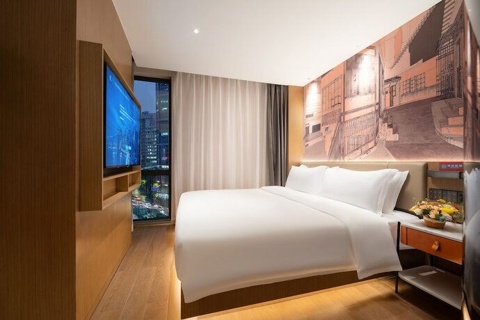 Imagen de la habitación del Hotel From.k Guangzhou. Foto 17