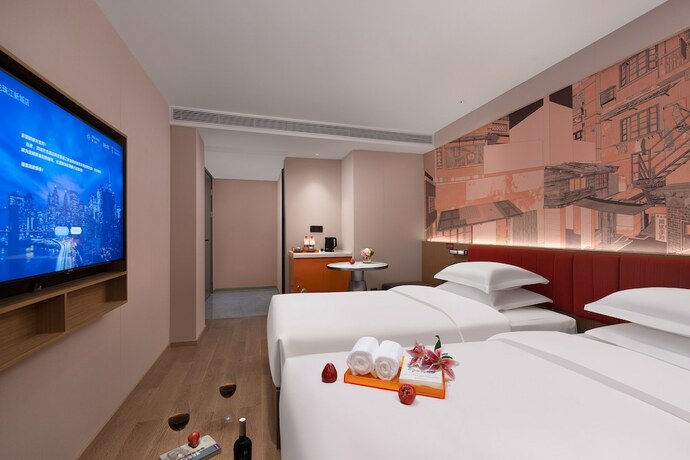 Imagen de la habitación del Hotel From.k Guangzhou. Foto 20