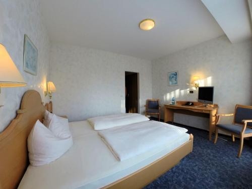 Imagen de la habitación del Hotel Frommanns Landhotel. Foto 8