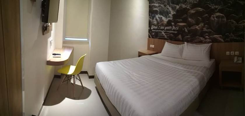 Imagen de la habitación del Hotel Front One Airport Solo. Foto 10