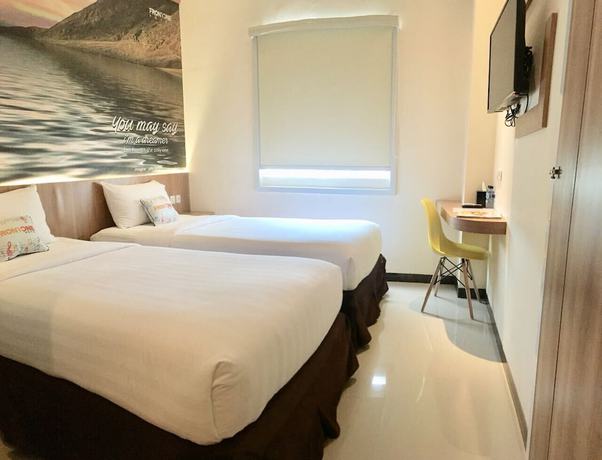 Imagen de la habitación del Hotel Front One Airport Solo. Foto 13