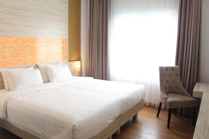 Imagen de la habitación del Hotel Front One Akshaya Karawang. Foto 6