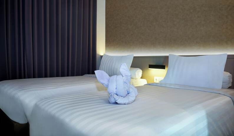 Imagen de la habitación del Hotel Front One Boutique Taman Anggrek. Foto 10