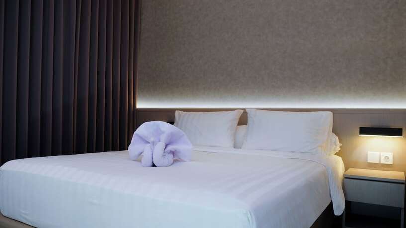 Imagen de la habitación del Hotel Front One Boutique Taman Anggrek. Foto 11