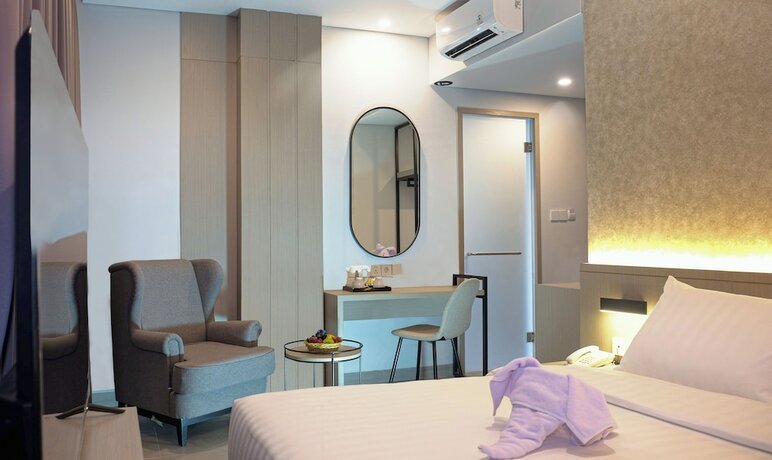 Imagen de la habitación del Hotel Front One Boutique Taman Anggrek. Foto 13
