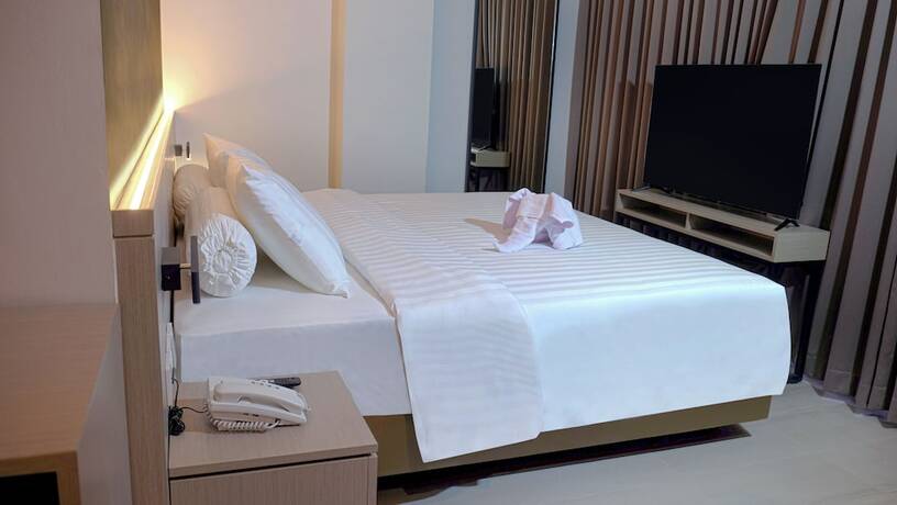Imagen de la habitación del Hotel Front One Boutique Taman Anggrek. Foto 15