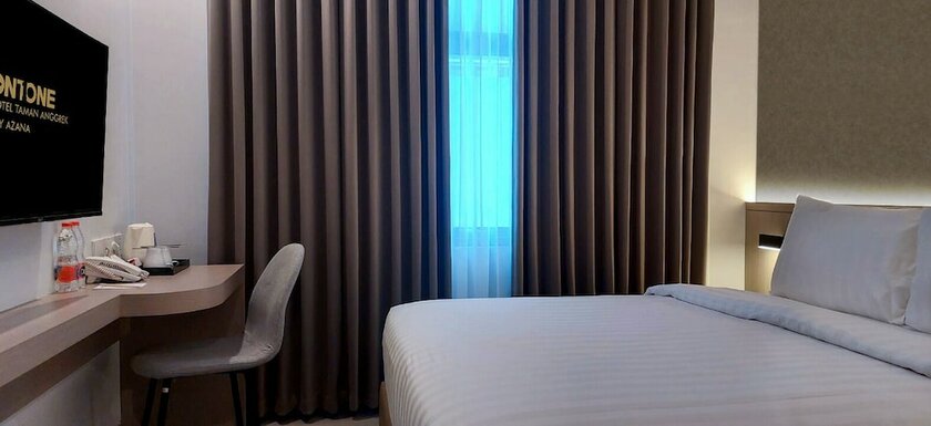 Imagen de la habitación del Hotel Front One Boutique Taman Anggrek. Foto 16