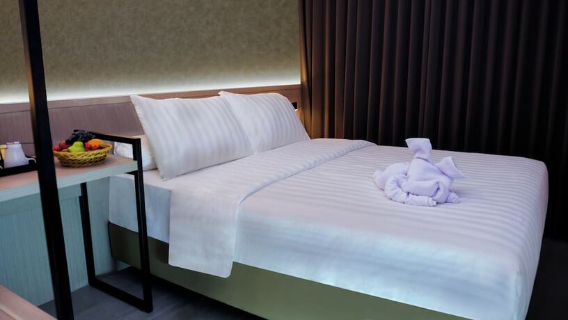 Imagen de la habitación del Hotel Front One Boutique Taman Anggrek. Foto 17