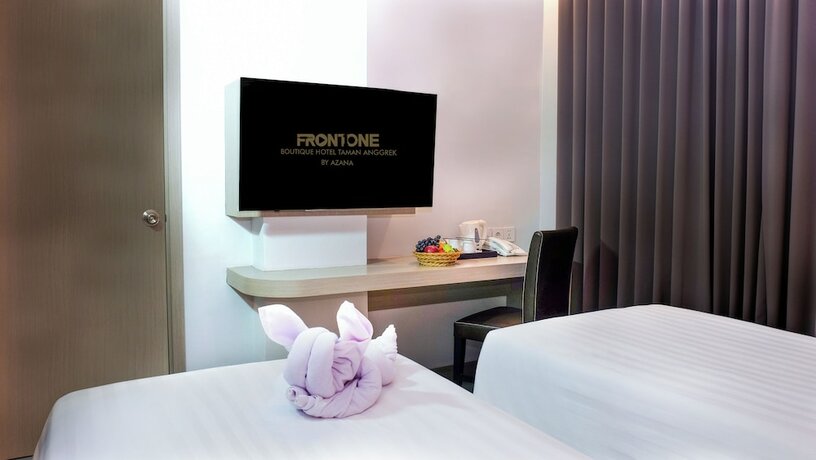 Imagen de la habitación del Hotel Front One Boutique Taman Anggrek. Foto 21