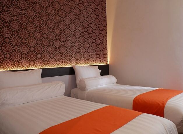 Imagen de la habitación del Hotel Front One Boutique Tugu Muda Semarang. Foto 17