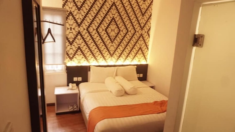 Imagen de la habitación del Hotel Front One Boutique Tugu Muda Semarang. Foto 18