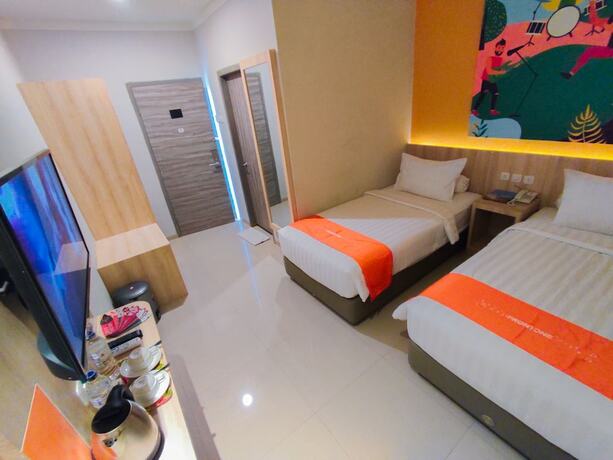 Imagen de la habitación del Hotel Front One Budget Abepura. Foto 14