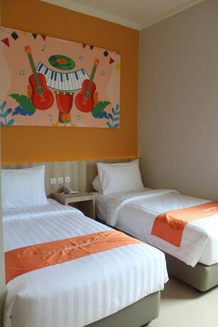 Imagen de la habitación del Hotel Front One Budget Abepura. Foto 15