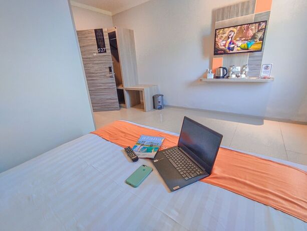 Imagen de la habitación del Hotel Front One Budget Abepura. Foto 18