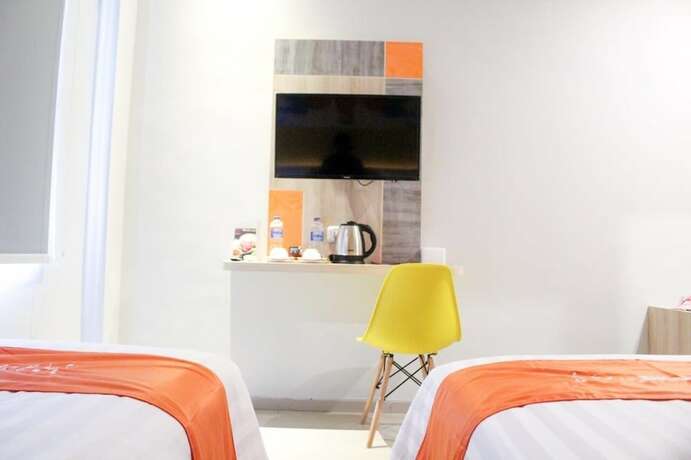 Imagen de la habitación del Hotel Front One Budget Abepura. Foto 19