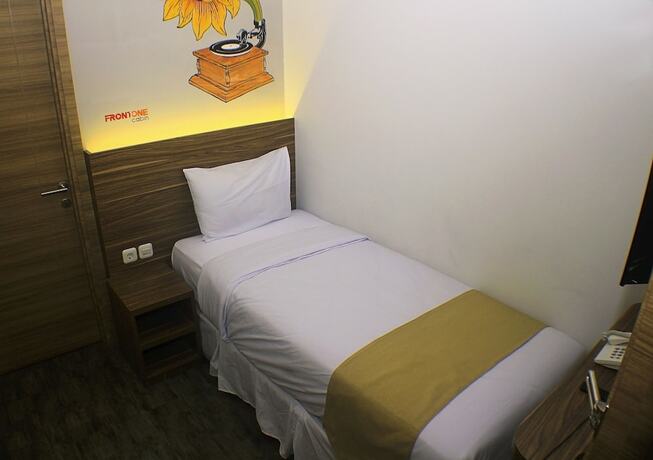 Imagen de la habitación del Hotel Front One Cabin Malioboro Jogja. Foto 22