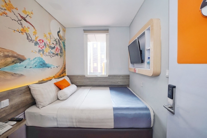 Imagen de la habitación del Hotel Front One Cabin Slamet Riyadi Solo. Foto 6