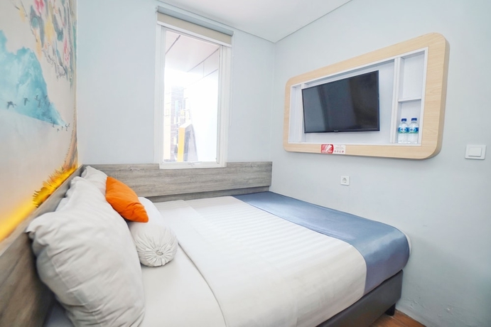 Imagen de la habitación del Hotel Front One Cabin Slamet Riyadi Solo. Foto 7