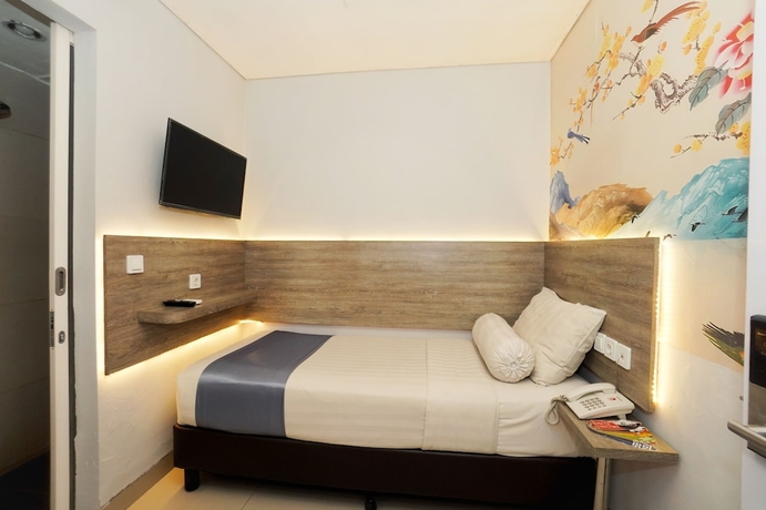 Imagen de la habitación del Hotel Front One Cabin Slamet Riyadi Solo. Foto 8