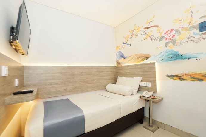 Imagen de la habitación del Hotel Front One Cabin Slamet Riyadi Solo. Foto 9