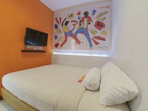 Imagen de la habitación del Hotel Front One Cabin Tirtonadi Solo. Foto 19