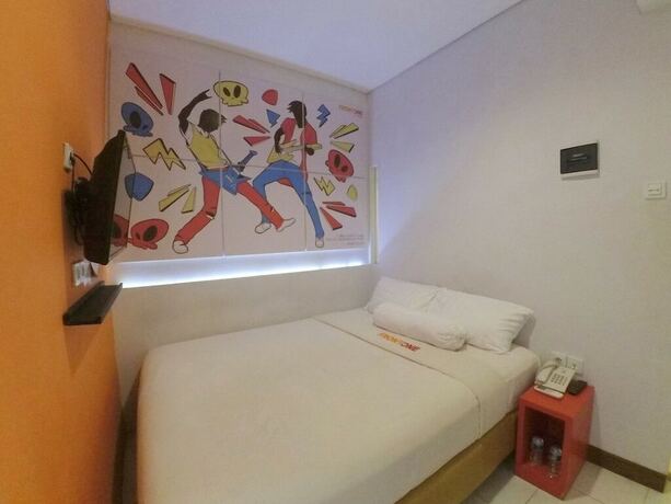 Imagen de la habitación del Hotel Front One Cabin Tirtonadi Solo. Foto 23