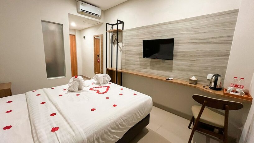 Imagen de la habitación del Hotel Front One Gombong. Foto 17