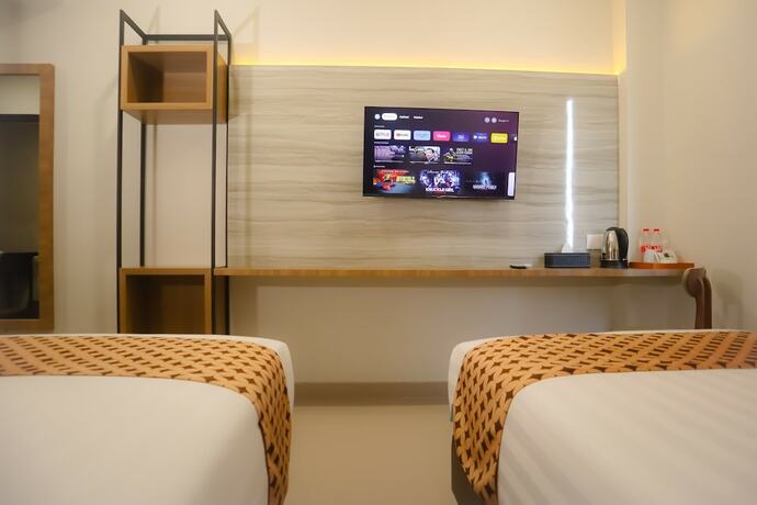 Imagen de la habitación del Hotel Front One Gombong. Foto 19