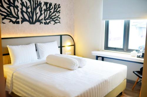 Imagen de la habitación del Hotel Front One Gosyen Salatiga, Kebonsari. Foto 15