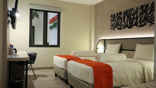 Imagen de la habitación del Hotel Front One Gosyen Salatiga, Kebonsari. Foto 16