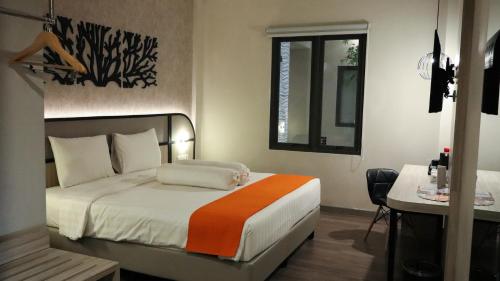 Imagen de la habitación del Hotel Front One Gosyen Salatiga, Kebonsari. Foto 17