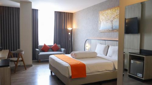 Imagen de la habitación del Hotel Front One Gosyen Salatiga, Kebonsari. Foto 18