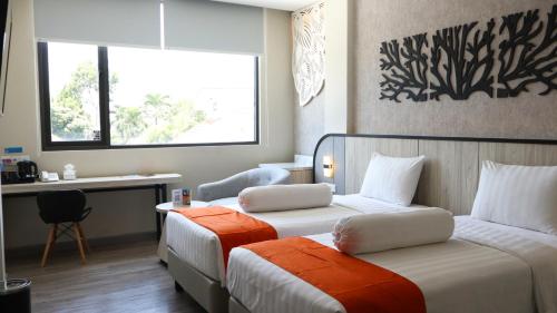 Imagen de la habitación del Hotel Front One Gosyen Salatiga, Kebonsari. Foto 19