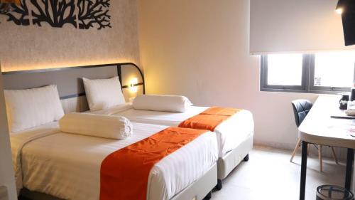Imagen de la habitación del Hotel Front One Gosyen Salatiga, Kebonsari. Foto 20