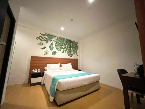 Imagen de la habitación del Hotel Front One Green Boutique Abepura. Foto 16
