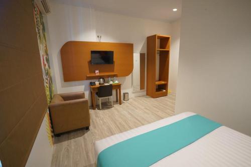 Imagen de la habitación del Hotel Front One Green Boutique Abepura. Foto 19