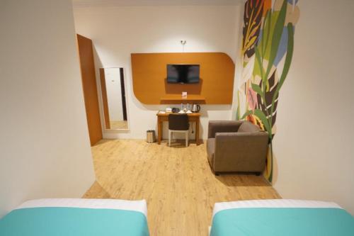 Imagen de la habitación del Hotel Front One Green Boutique Abepura. Foto 20