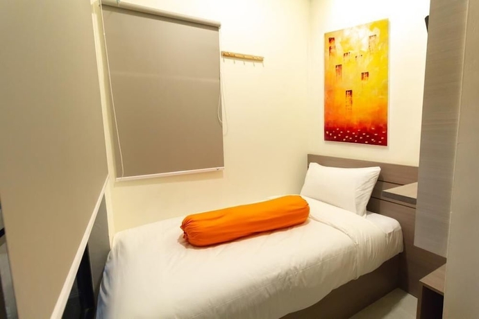 Imagen de la habitación del Hotel Front One Residence Syariah Mampang. Foto 6