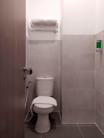 Imagen de la habitación del Hotel Front One Residence Syariah Mampang. Foto 9