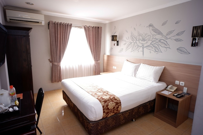 Imagen de la habitación del Hotel Front One Resort Yogyakarta. Foto 2