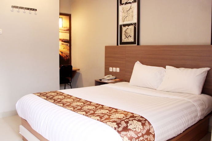 Imagen de la habitación del Hotel Front One Resort Yogyakarta. Foto 5