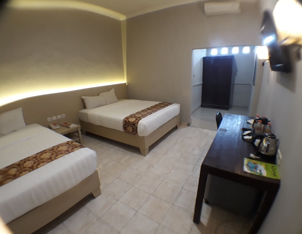 Imagen de la habitación del Hotel Front One Resort Yogyakarta. Foto 7