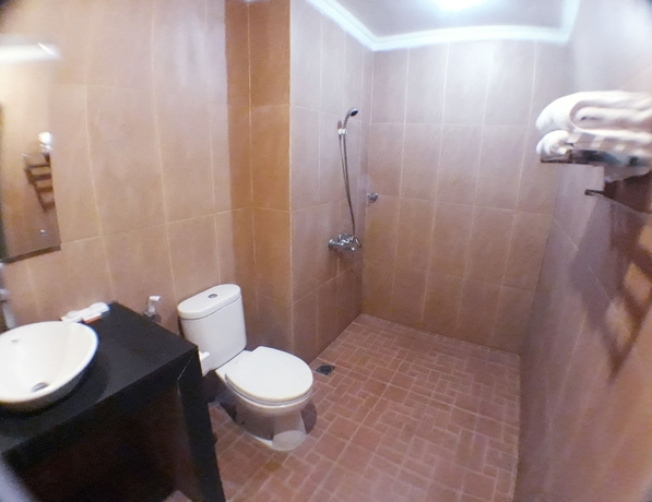 Imagen de la habitación del Hotel Front One Resort Yogyakarta. Foto 14