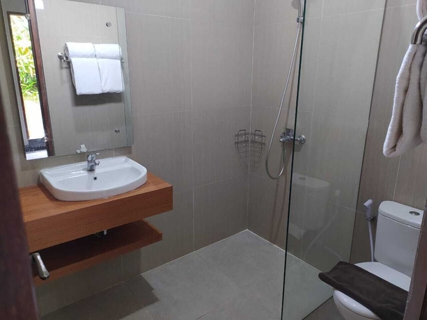 Imagen de la habitación del Hotel Front One Resort Yogyakarta. Foto 16