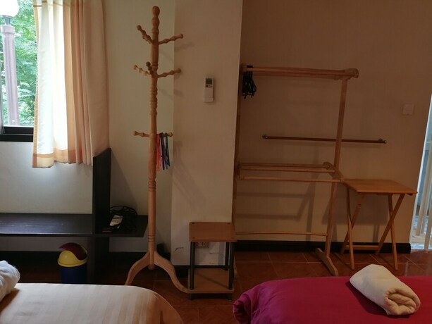 Imagen de la habitación del Hotel Frontier Homestel. Foto 16